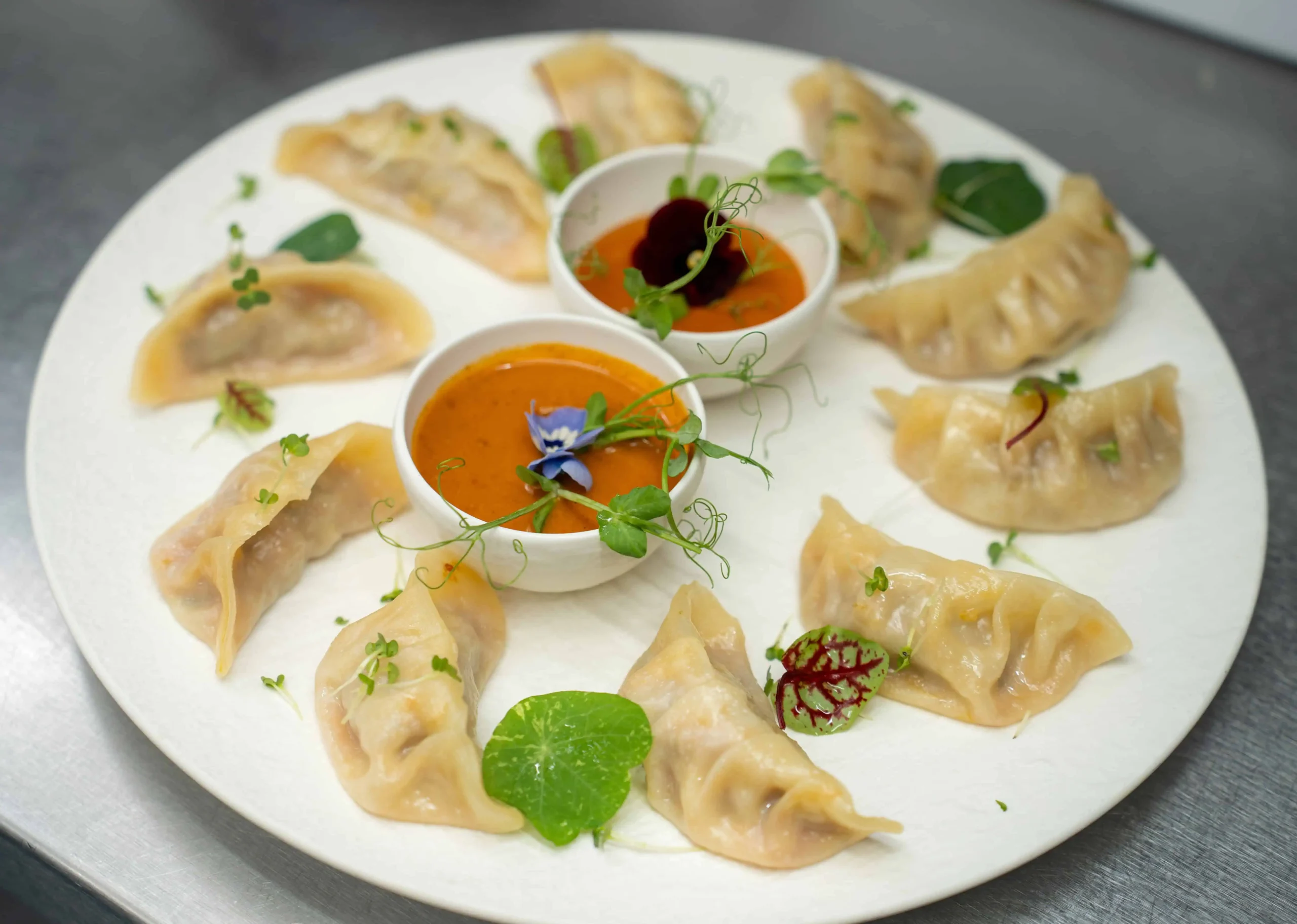 Dé Buddha Chicken Momo
